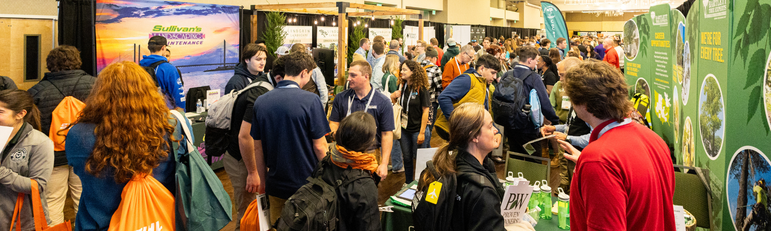 college students visiting vendor booths at the nclc
